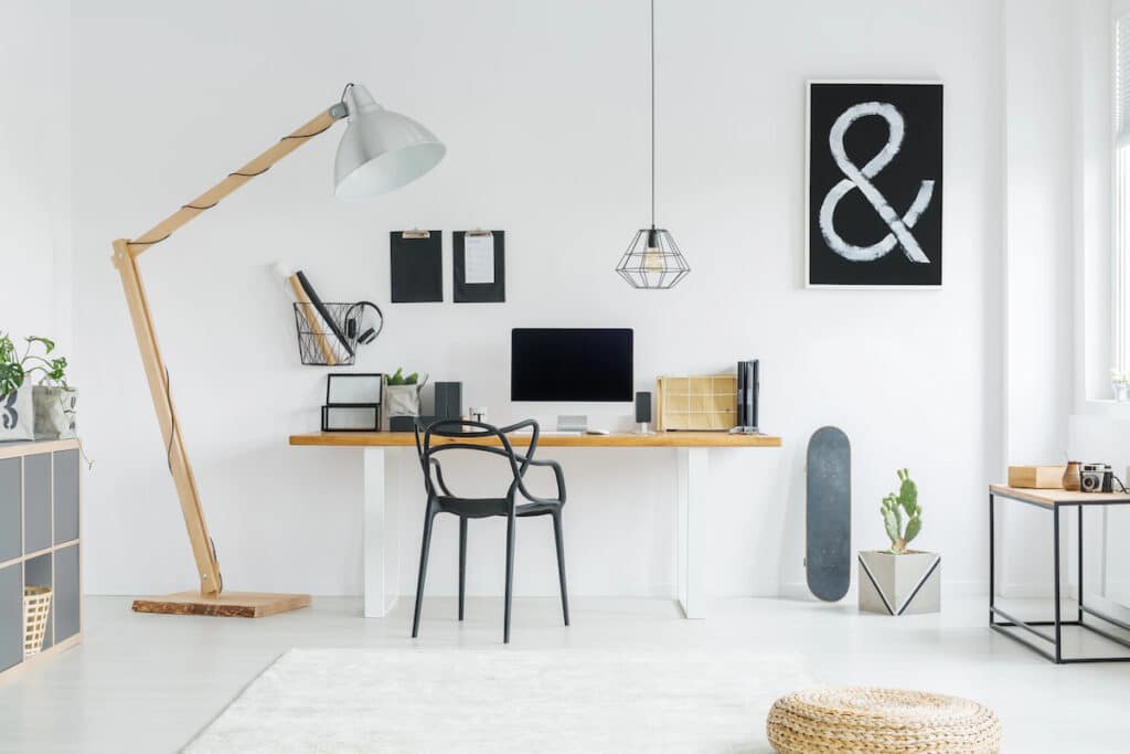 monochrome home office with wall art