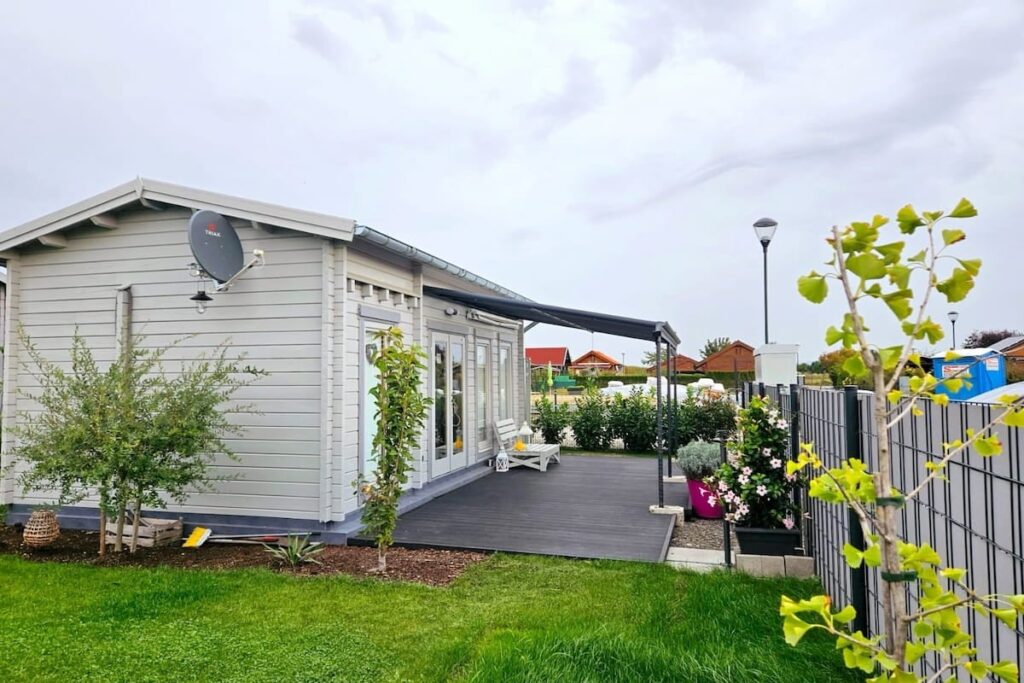 light green coloured summerhouse