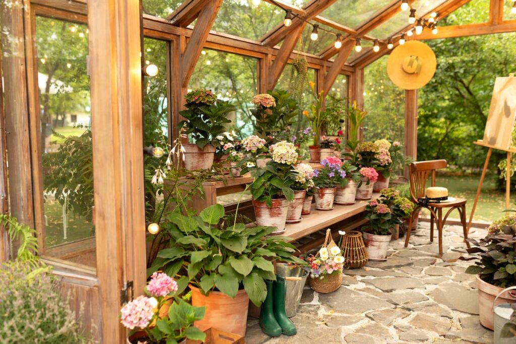 Interior of a wooden illuminated greenhouse