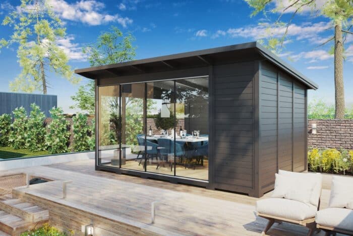 Modern grey garden house with sliding glass doors Modern grey garden room with sliding glass doors
