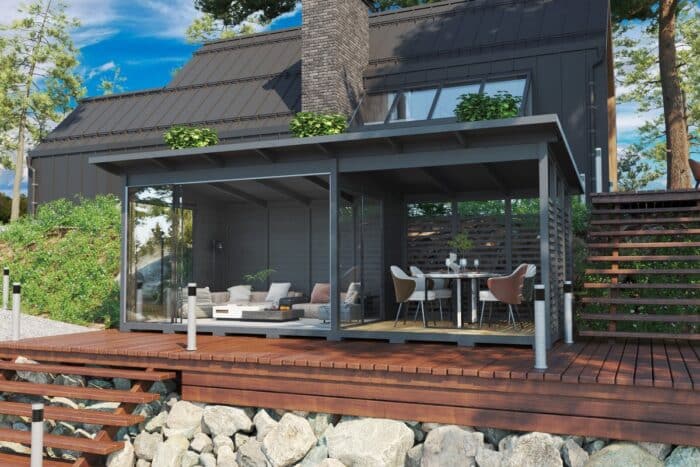 Modern grey garden room with glass wall and veranda